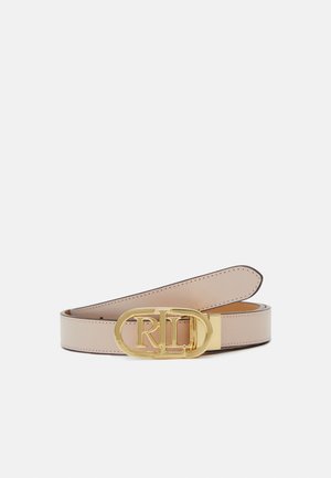 Ceinture en cuir beige avec boucle ovale dorée présentant les lettres entrelacées « RLD » sur un fond blanc uni.