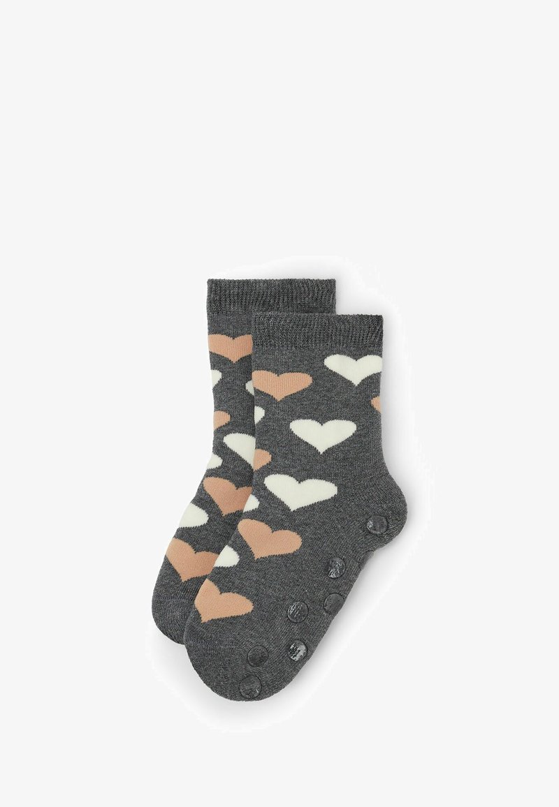 Calze per bambini grigie con motivo a cuore in crema e marrone chiaro. Soletti texturizzati con punti antiscivolo. Bordo a costine per una vestibilità sicura.