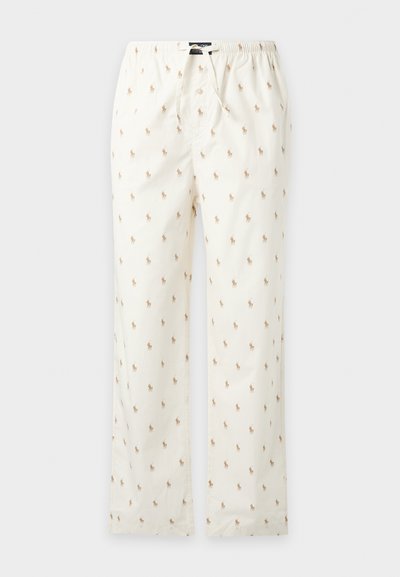 Pantalon de pyjama blanc avec petits motifs beiges de cavaliers, doté d’une taille élastique et d’un devant boutonné.