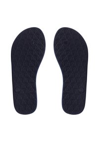 Semelles en caoutchouc noir avec un motif de grip texturé, étiquetées avec les tailles 6/7, présentant des bords arrondis et une symétrie pour les pieds gauche et droit.