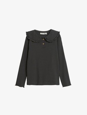 Donkergrijze lange mouwen top met ribbelstructuur, ronde kraag met ruches, drie knopen aan de voorkant en flared mouwen.