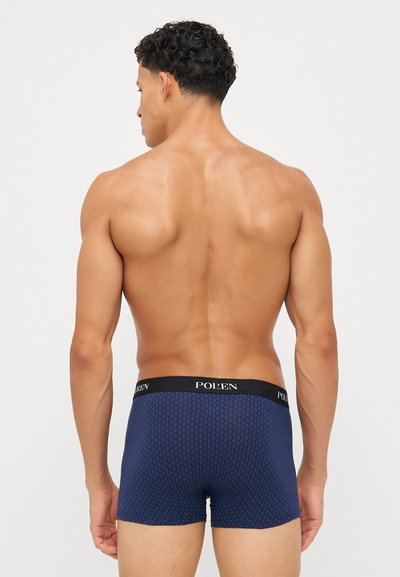 Boxeri scurti cu model marin, cu un brâu elastic negru pe care este inscripționat numele brandului "POLEN" cu litere albe. Textură netedă, formă ajustată.