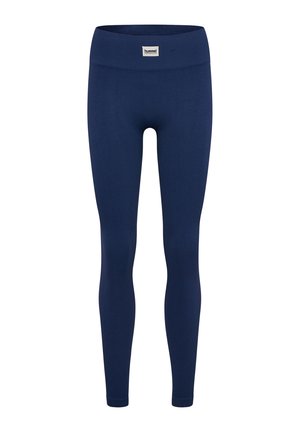 Marineblå leggings lavet af ribbet materiale, med en bred elastisk talje og et lille logomærke foran. Designet til at sidde tæt.