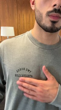 Gray long-sleeve shirt with a crew neck and a textured finish features a black graphic print: "TWO HORSES ATHLETIC CLUB" on the chest.