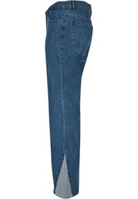 Jeansy dżinsowe w średnim odcieniu niebieskiego z prostymi nogawkami, pięcioma kieszeniami oraz wycięciem przy rozcięciu u dołu dla dodatkowego stylu.