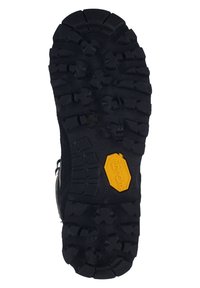 Sort gummisål med dybe mønstre for godt fodfæste. Har et gult sekskantet Vibram-logo. Forstærkede kanter og struktureret overflade.