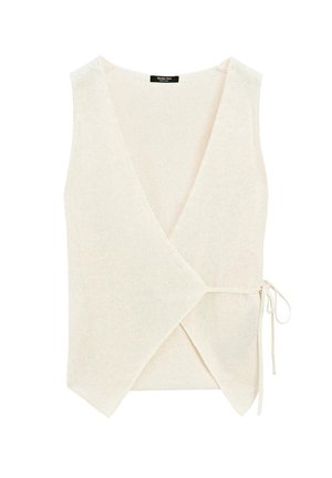 Haut style wrap en tricot léger beige clair, présentant un décolleté en V, une fermeture à nouer sur le côté et une surface texturée.