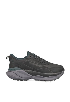 Dunkelgrauer wasserdichter Sneaker mit dicker gepolsterter Sohle und Schnürsenkeln, entwickelt für Outdoor-Spaziergänge oder Läufe.