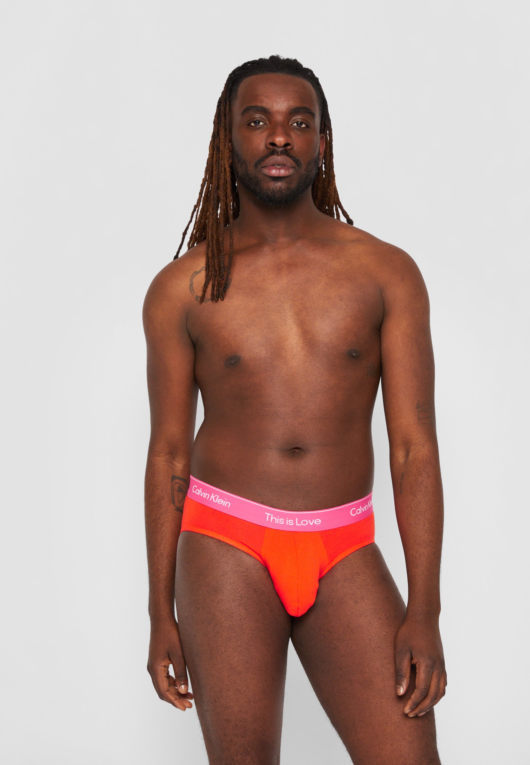 Calvin Klein Underwear Liquid Stretch Micro Hip Brief in Orange