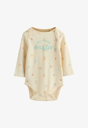 Šviesiai geltonas kūdikių bodis su trumpomis rankovėmis, pagamintas iš gofruoto audinio, su spalvingais Velykų tematikos printais ir mėlynu užrašu „Mano pirmosios Velykos“.