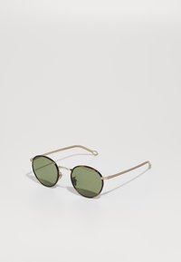 Vybráno, matte pale gold-coloured