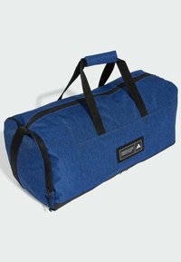 Blue polyester duffel bag with black accents, dual handles, and a zipper closure; includes a rectangular label on the side.