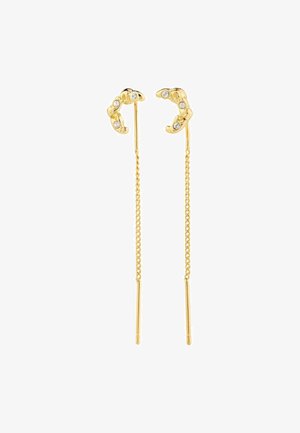 Gold-tone earrings featuring a unique claw design adorned with clear gemstones. They have elongated, delicate chain accents for added elegance.