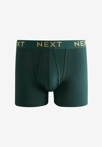 Shorts boxers vert foncé avec une ceinture texturée portant le nom de marque "NEXT" en lettres dorées. Coupe classique avec une finition en tissu doux.