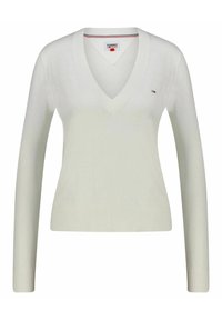 Maglione a V con maniche lunghe di colore crema chiaro. Realizzato in tessuto morbido e liscio con polsini e orlo a costine. Presenta un piccolo logo sul petto.