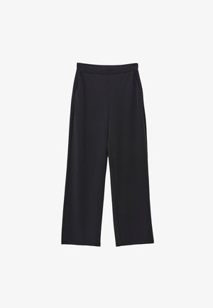Pantalon noir à jambes larges avec poches latérales et ceinture, présenté à plat sur un fond blanc.