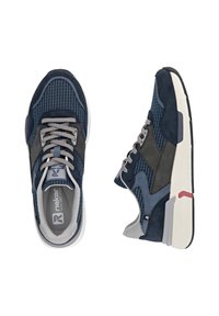 Navy blue sneakers with a mix of suede and mesh materials. Features vertical striped pattern, grey laces, and a white midsole with red accent.