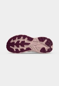 Running shoe sole with deep pink and maroon tread patterns designed for traction on varied surfaces.