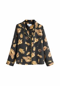 Top de pijama din satin cu motive aurii de mână și inimă pe un fundal negru, cu o margine galbenă și un buzunar la piept. Mâneci lungi.