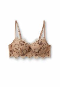 Spets-bh i nude med blommönster, scallopade kanter och tunna justerbara remmar. Mjuk textur och underwire-stöd för form.