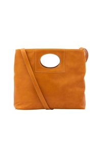 Leder-Handtasche in Orange, mit strukturierter Form, kreisförmigem Ausschnittgriff und verstellbarem Schulterriemen. Glatte Textur und minimalistisches Design.