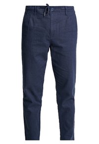 Granatowe spodnie wykonane z lekkiego materiału, z elastycznym paskiem w talii, plisowanym przodem i zwężającym się krojem nogawek.