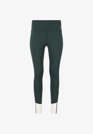 Leggings de sport verts avec une taille haute. Présentent un accent blanc au niveau de la cheville, fabriqués en tissu extensible et doux.