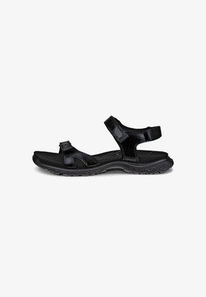 Black sandals featuring patent straps, adjustable hook-and-loop closures, and a textured rubber sole for grip and comfort.