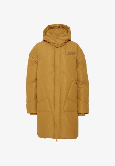 Long puffer coat in mustard yellow, featuring a hood, button closure, and quilted pattern. Subtle logo detail on the chest.