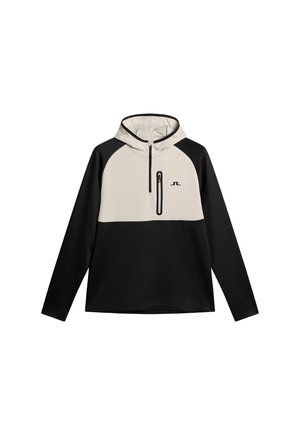 Hoodie z beżowym przodem i czarnymi rękawami. Posiada kieszeń na zamek, prążkowaną strukturę oraz kontrastowe kolory dla wizualnego zainteresowania.