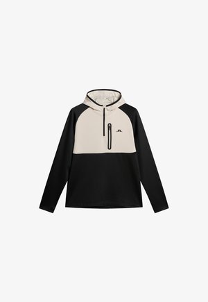 Hoody met een beige voorkant en zwarte mouwen. Heeft een ritszak, ribbelstructuur en contrasterende kleuren voor visuele belangstelling.