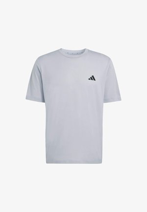 Lichtgrijs katoenen T-shirt met korte mouwen, een ronde halslijn en een zwart Adidas-logo op de linkerborst. Gladde textuur.