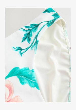 Kukallinen uima-asukangas, jossa on valkoinen tausta, pehmeä rakenne ja turkoosit lehdet yhdistettynä vaaleanpunaisiin kukkiin. Huomattava sileä kaulusreuna.