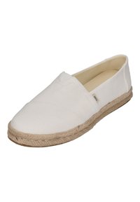 Bílé plátěné espadrilky s designem na nazouvání, jutovou podrážkou a šitými detaily na přední straně. Interiér je béžový.