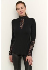 Black long-sleeve top with a high lace collar and lace accents on sleeves. Features a keyhole cutout at the neckline. Smooth texture.