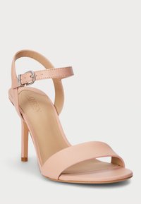 Rožiniai odiniai stiletto aukštakulniai sandalai su kulkšnies dirželiu, atviru pirštu, lygia tekstūra ir plona sagtimi, leidžian�čia reguliuoti dydį.