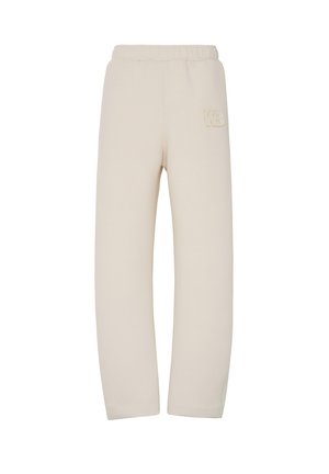 Pantaloni tuta beige con vita elasticizzata, caratterizzati da un logo in rilievo discreto sulla coscia superiore. Realizzati in un morbido tessuto testurizzato.