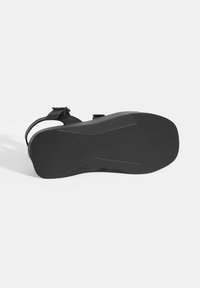 Desa Keilsandalette - black
