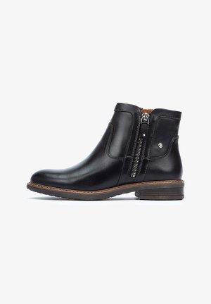 Schwarze Leder-Stiefelette mit seitlichem Reißverschluss, runder Zehenpartie, niedrigem Blockabsatz und kontrastierenden braunen Nähdetails. Glatte Oberfläche.