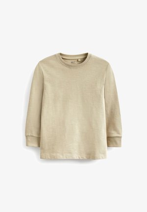 Beige Langarm-T-Shirt aus weichem Material, mit rundem Halsausschnitt und enganliegenden Bündchen. Glatte Textur ohne sichtbare Muster oder Grafiken.