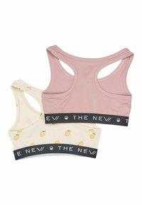 Kaksi hihattomaa bralette-topia: yksi vaaleanpunainen ja yksi kerma, jossa on pieniä keltaisia sitruunakuviota, molemmissa musta logonauha.