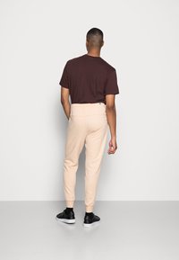 Nike Sportswear REVIVAL - Calças de fato de treino - white ony