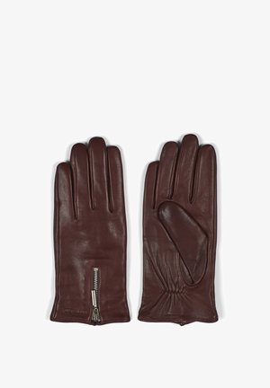 Gants en cuir marron dotés d'une texture lisse, d'un design à cinq doigts et d'une accent de fermeture éclair au poignet avec un détail en tissu froncé.