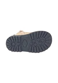Suola di scarpa in gomma con profonde scanalature per una migliore aderenza, dotata di una forma esagonale al centro, bordata da un design decorato e da creste.