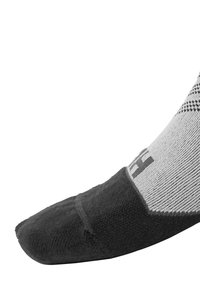 Calcetín de longitud a la rodilla en negro y gris con un patrón texturizado, puntera reforzada y detalle de logo. Tejido suave con un ajuste ceñido.