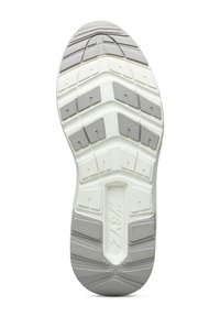 Sula av en sko med vita och gråa mönster för grepp och "W6YZ"-logotyp präglad i mitten på en vit bakgrund.