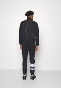 Sergio Tacchini RYO TRACKSUIT - Melegítő - black/white/surf the web