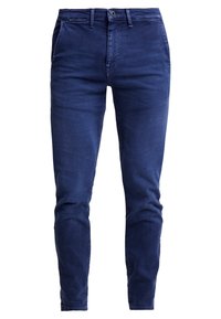 Mörkblå denimjeans med slim fit, femficksdesign, knäppning och subtila sömnadsdetaljer. Mjuk textur och slät yta.