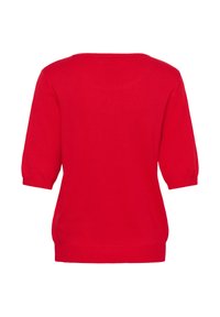 Rød strikket sweater med trekvartlange pufærmer, rund udskæring og sideslids. Glat tekstur og let stræk i stoffet.