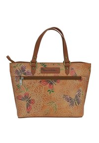 Beige Tragetasche mit braunen Ledergriffen, verziert mit floralen und Schmetterlingsmustern. Enthält eine vordere Reißverschlusstasche und strukturierte Oberflächendetails.